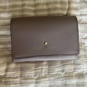 kate spade taupe leather compact wallet with gold logo